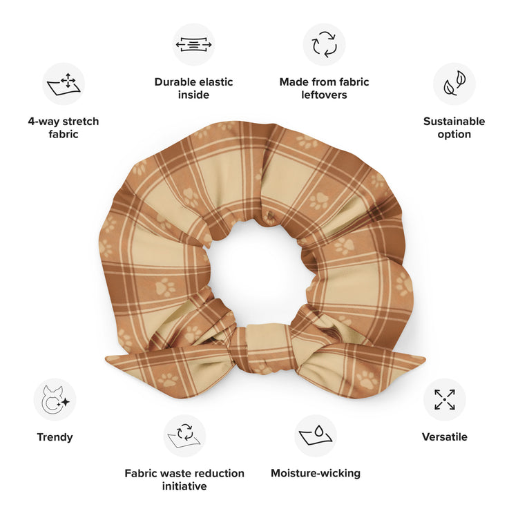 Plaid scrunchie with features listed on a white background