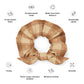 Plaid scrunchie with features listed on a white background